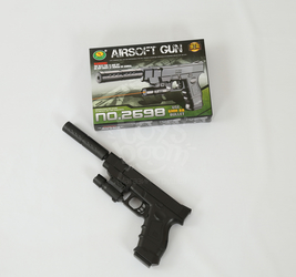 Пистолет с пулями в коробке. 